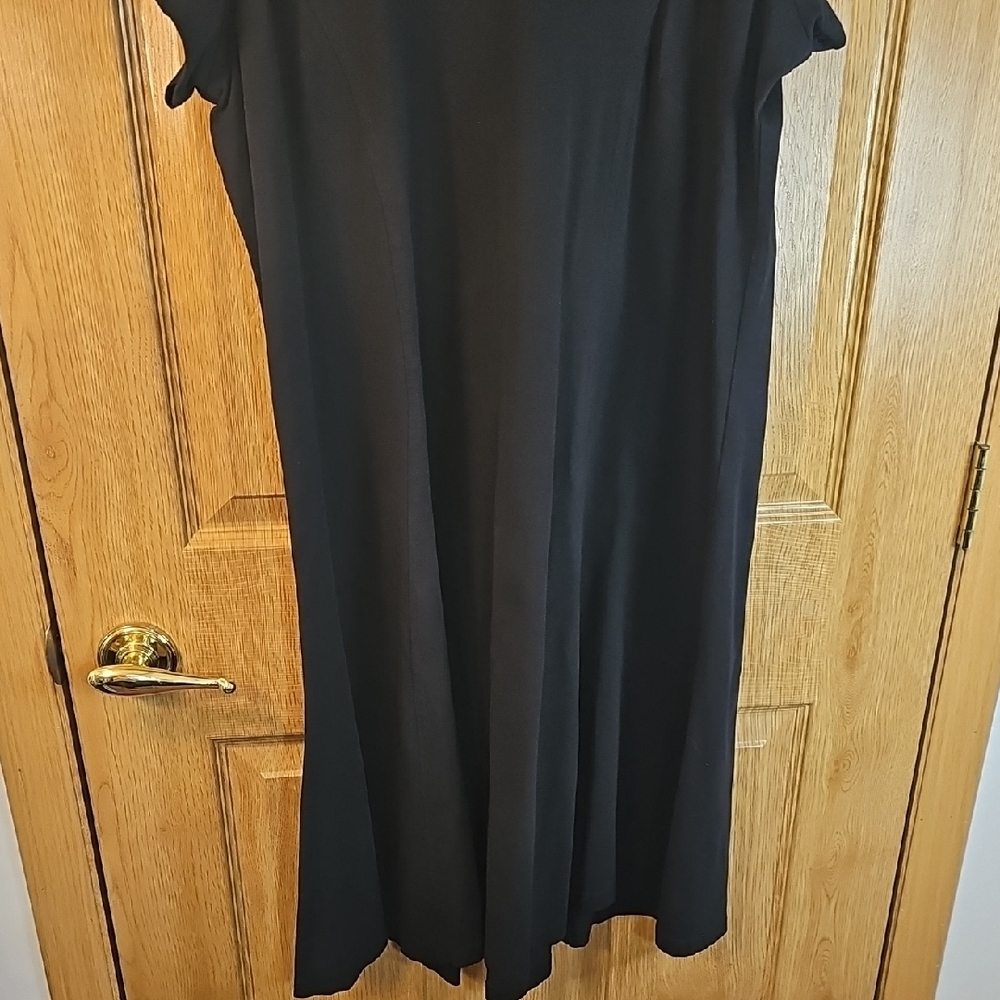 Chic Black Mini Dress with Embellished Neckline - Picture 10 of 10